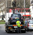 MINI loaded onto tow truck.jpg
