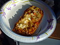 Deep-fried pizza on paper plate.jpg