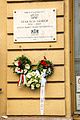 Sándor Szakácsi memorial plaque Budapest Ferencváros with wreaths.jpg